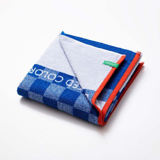 Toalha de praia 140x70cm quadrados azuis kids benetton
